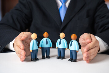 A businessman retains his employees. Team insurance. Mentoring and support. Corporate culture...