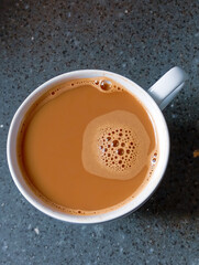 Overhead View of Hot Coffee or Tea with Milk