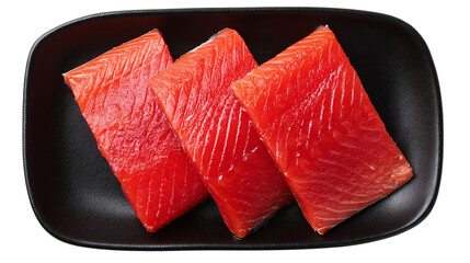 Red fish on a black plate isolated on a transparent background clipart