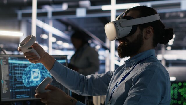 Data center developer using virtual reality technology to visualize artificial intelligence LLM neural networks. Server farm IT expert using VR headset equipment to oversee AI systems, camera A