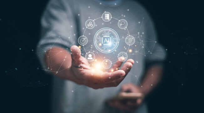 Artificial intelligence. Glowing AI interface floating above a hand with connected icons for data, automation, analytics, security and innovation. Modern digital technology and smart solutions.