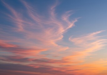 Vibrant sunset sky with soft clouds and warm colors natural background