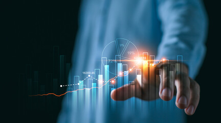 Business, finance and investment concept. Business man analyzing and calculating tax, interest...