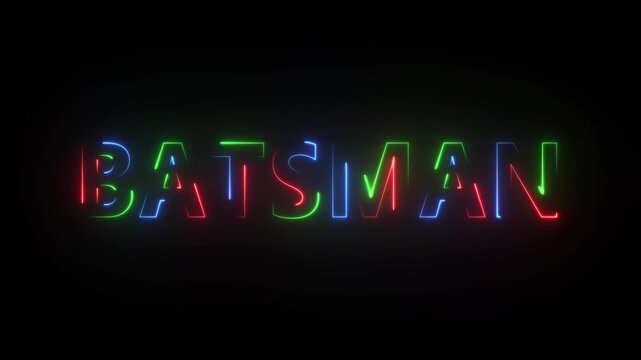 Neon sign spelling out the word BATSMAN in red green and blue against a black background bats man
