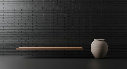 An earthy vase stands beside a floating shelf in front of a dark brick wall providing contrast.