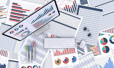 ビジネス書類とデータを表示したデスクトップパソコン