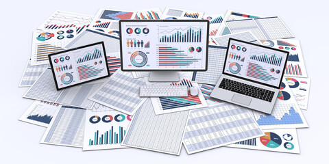 ビジネス資料とデータを表示したパソコン