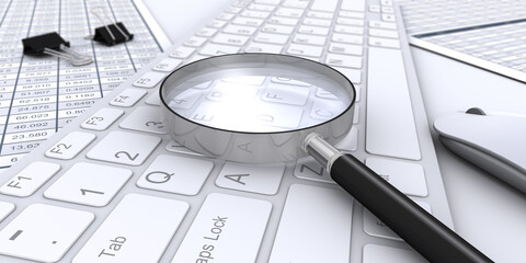 虫メガネとキーボードとビジネス書類