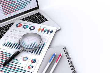 ビジネス書類とノートパソコンとビジネスグッズ