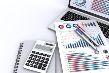 ビジネス書類とノートパソコンとビジネスグッズ