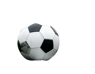 A classic black and white soccer ball rests on a grassy surface, set against a contrasting dark background