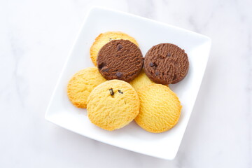 Delicious Cookies on white plate
