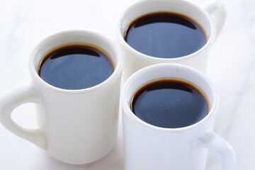 Three cups of Coffee image
