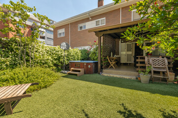 Fototapeta premium Gourmet terrace with a pizza oven, granite countertop, and food preparation area for outdoor cooking