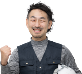 鳶職や現場作業員のガッツポーズカメラ目線　背景透明　笑顔の気合いを入れるガッツポーズ