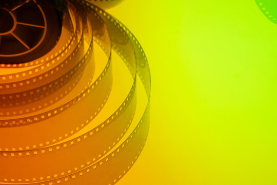 abstract colored background with film strip - Powered by Adobe