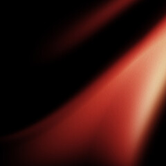 Grainy orange light diagonal leak on black background