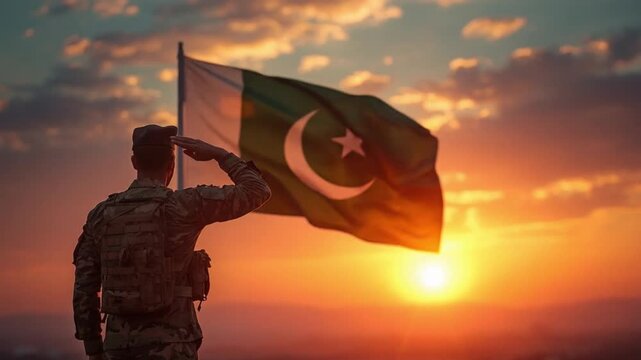 Soldier Holding Pakistan Flag at Sunrise &ndash; Pakistan Day Tribute