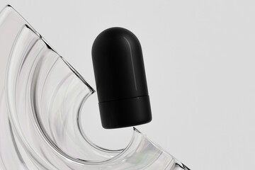 foundation Stick packaging mockup, glossy black plastic makeup twist up tube packaging, Sunscreen Stick Tubes with clear plastic cap, Cylindrical Deodorant Packaging, round Rotating lip balm container