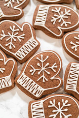 Beautifully Decorated Mitten Cookies with Royal Icing Designs