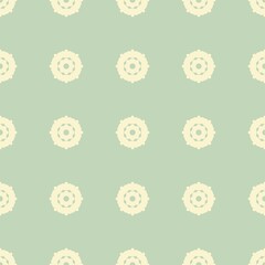 Seamless vintage floral pattern with circular motifs on green background