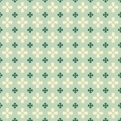 Seamless vintage floral pattern with green clover motifs