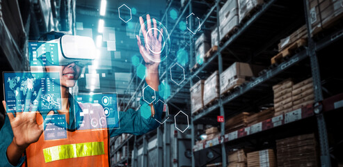 Future virtual reality technology for innovative VR warehouse management . Concept of smart technology for industrial revolution and automated logistic control .
