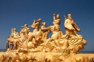 Obraz premium The golden statues of the eight immortals in the pavilion of Penglai, China