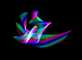 Abstract colorful light streaks and curved lines lightpainting . Abstract light art.
