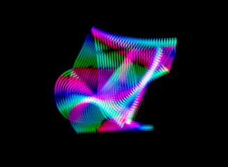 Abstract colorful light streaks and curved lines lightpainting . Abstract light art.