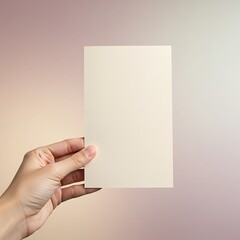 Hand Holding Blank Notecard: Soft Hues, Gentle Moment