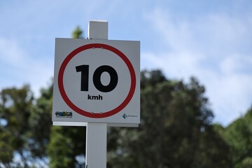 Outdoor Circular Speed Limit Warning Signpost