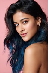 Obraz premium Vibrant Side-Profile Portrait of a Latin Woman with Metallic Blue Hair Tips and Warm Glowing Tan Skin 