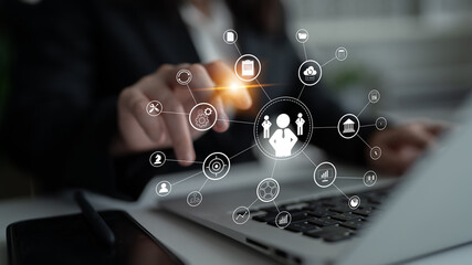 A concept of centralized business management and corporate strategy. A leadership team connecting to all functions like finance, operations, and planning. Motif