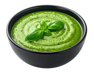Green soup with basil in black bowl, circular texture