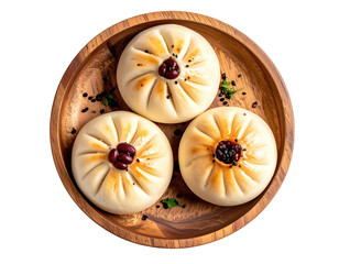 Three buns on wooden plate. Garnished with beans and herbs