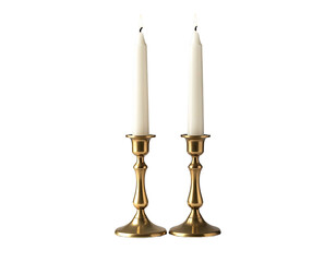 Two ivory candles in brass holders
