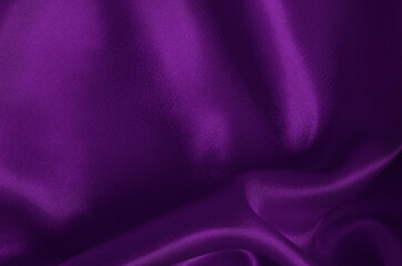 Purple fabric cloth texture for background and design art work, beautiful crumpled pattern of silk or linen.