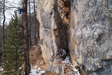 a view of a crevice in a rock high in the mountains