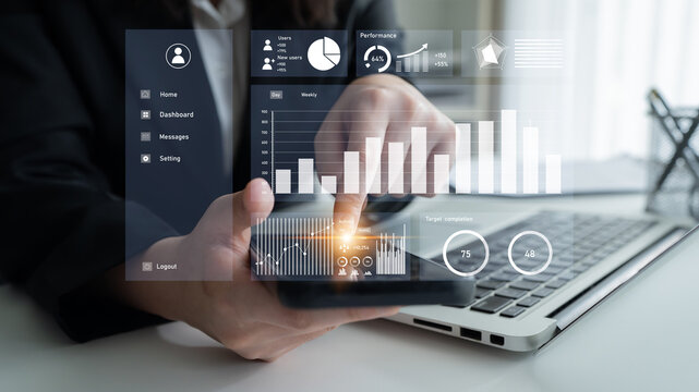 A business professional examines digital analytics on a smartphone, showcasing performance metrics and data trends in a sleek modern office environment. Impute