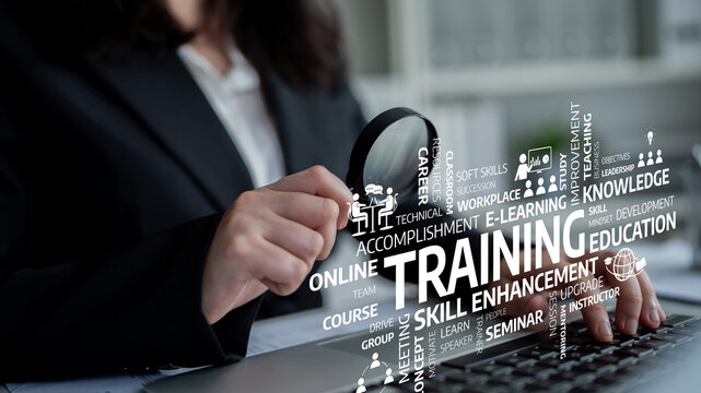 A focused professional engaging in online training, highlighting concepts of skill enhancement and education for career growth in a modern workspace environment. Tessel