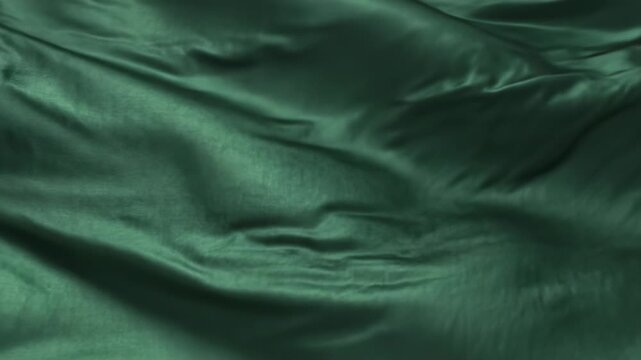 Emerald Silk: Captivating folds of rich, emerald silk ripple gently, displaying an alluring texture with a soft sheen. A luxurious aesthetic, exuding elegance and refinement.