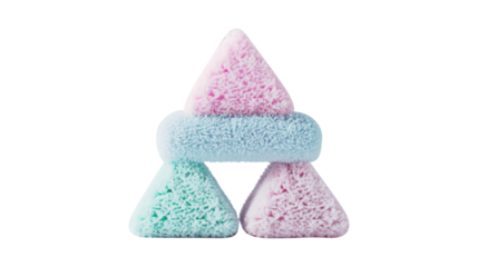 Colorful pastel pyramid-shaped marshmallows isolated on white background