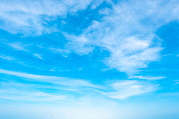A bright, clear blue sky meets a glowing white horizon, suggesting a serene, open, and with sunlight of beautiful cloudy sky. landscape or abstract background.	

