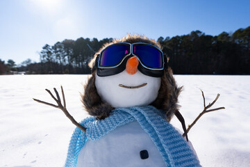 Snowman aviator preparing winter gift delivery. Holiday snow scene with toy plane and snowman....