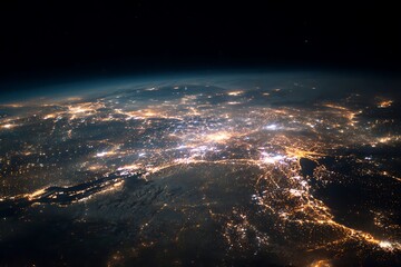 Fototapeta premium Illuminated urban sprawl stretches across a continent's surface viewed from high altitude during the night