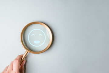 mental, health, support, therapy, awareness, anxiety, A magnifying glass highlighting a smiling icon symbolizing positive mental wellbeing and emotional awareness.