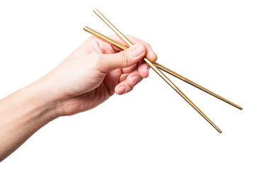 isolated of a man's hand holding a golden chopstick.