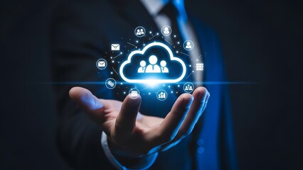 Cloud computing technology concept man holding a glowing cloud icon in hand