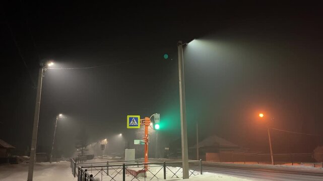 Night Fog, Frost, Streetlights and Green Pedestrian Light